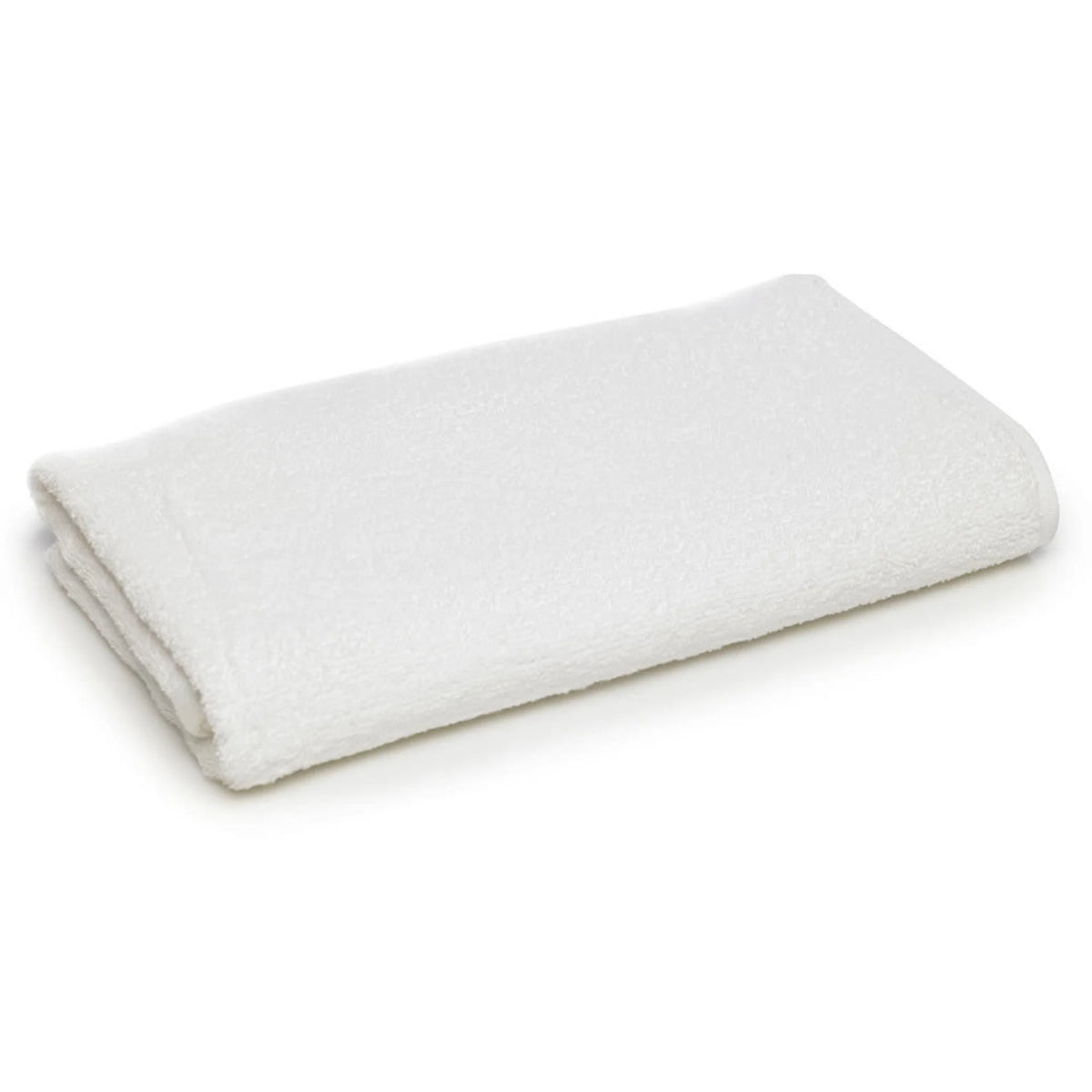 A neatly folded Ganesh Mills Magic Super Pool Towel - White rests on a plain surface, ideal for poolside use or anyone needing quality towels in bulk.