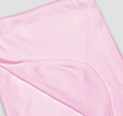 A close-up of a soft, light pink blanket with a folded corner shows its smooth texture—ideal for pairing with KSE Twill Underpads - 10 oz. (34 x 36) as an effective incontinence solution.