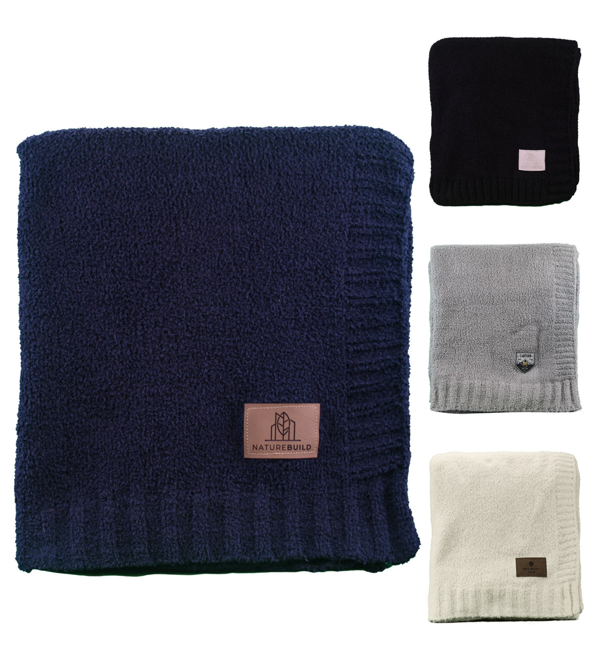 Four folded Cloud Nine Soft Throws by Pro Towels in navy blue, black, light gray, and cream, each with a small rectangular brand patch on the corner and custom embroidery, displayed on a white background.