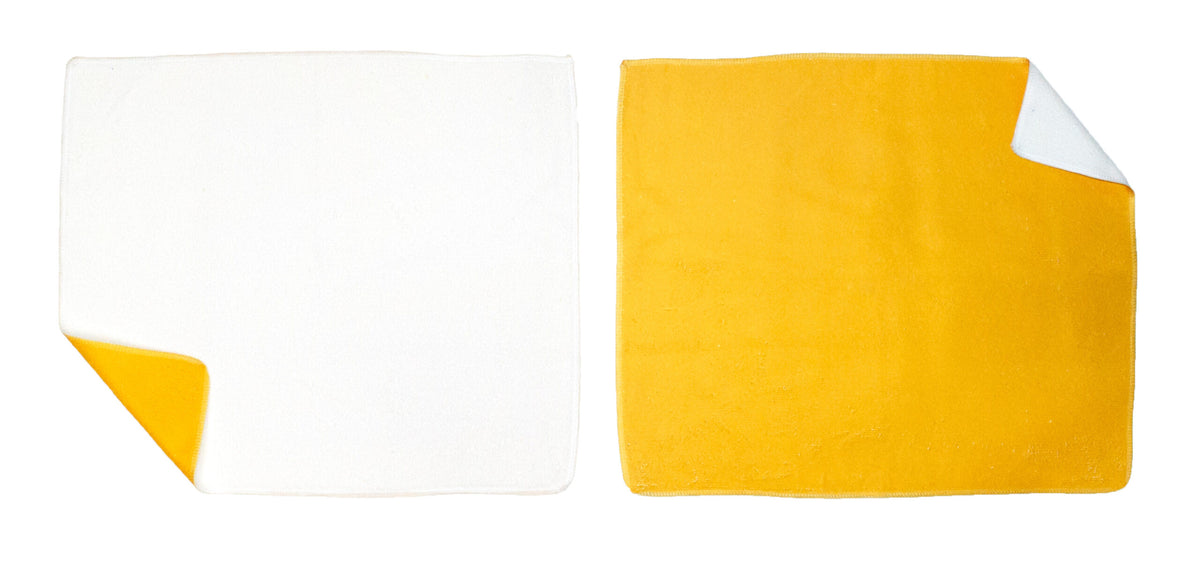 Two Pro Vision Colored Rally Towels by Pro Towels are shown side by side on a white background. The left towel is white with a yellow underside, and the right towel is yellow with a white underside, each corner slightly flipped.
