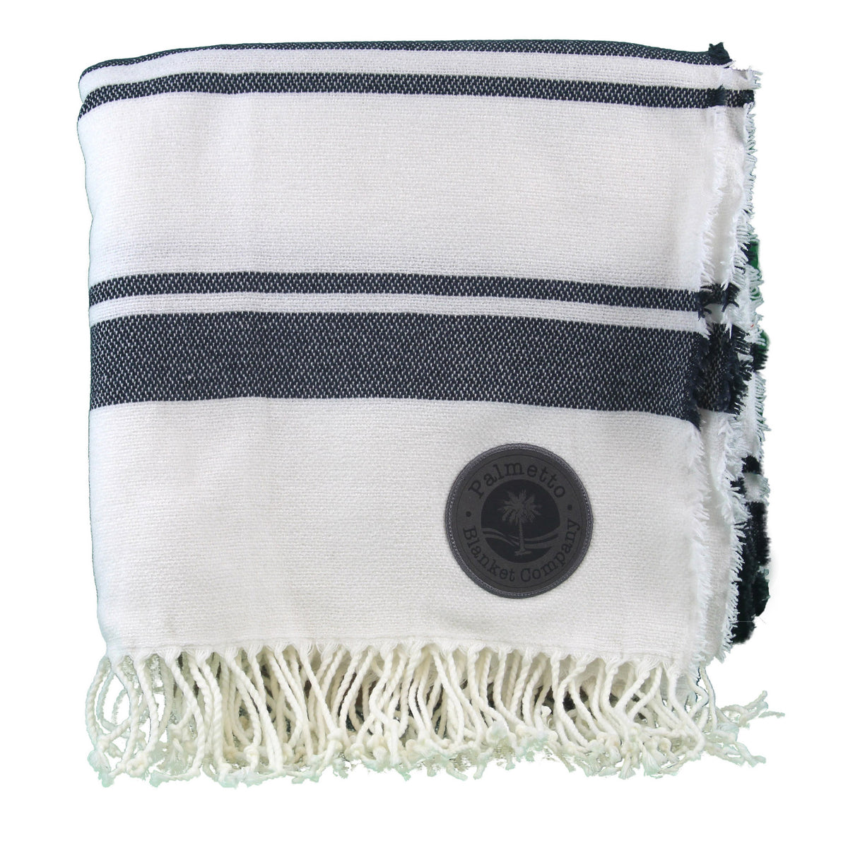 The Four Seasons Striped Blanket by Pro Towels features black stripes, fringed edges, and a corner patch—ideal as a wholesale throw or for custom embroidery.