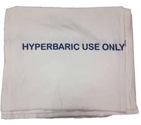 A folded white KSE Hyperbaric Blanket, designed for hyperbaric chamber use, features HYPERBARIC USE ONLY printed in bold blue letters across the center.
