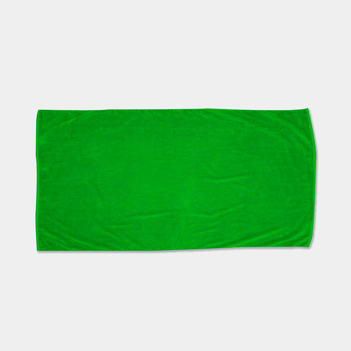 The Pro Towels Beach Towel - Jewel Collection is a plain, rectangular green towel laid flat on a white background—ideal for wholesale orders or custom embroidery.