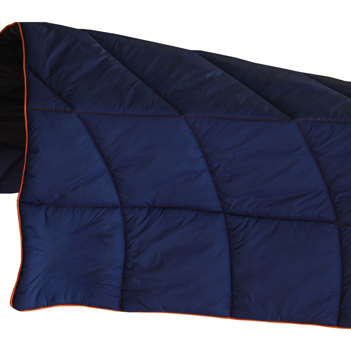 A close-up of the Lofthouse Camping Blanket by Pro Towels, a navy blue weather-resistant blanket with orange piping, partially folded against a white background.