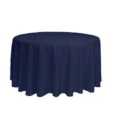A round table covered with a Ganesh Mills Oxford Round Table Linen - Multicolor, evenly draping down the sides.