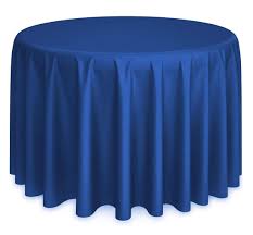A round table draped with a Ganesh Mills Oxford Round Table Linen - Multicolor tablecloth that hangs evenly on all sides.