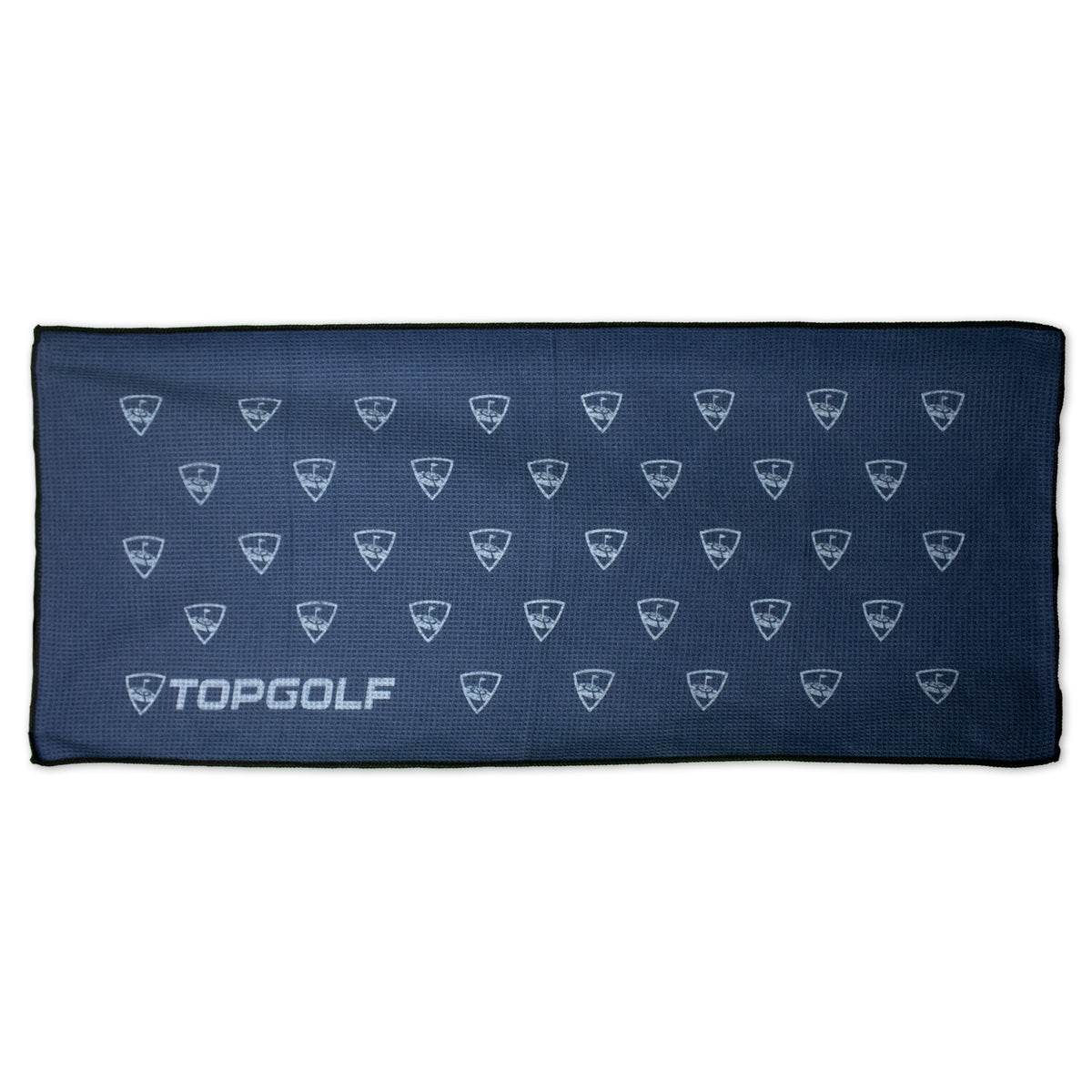The Microfiber Waffle Caddy Towel by Pro Towels is a dark blue golf towel featuring a repeating white Topgolf logo shield pattern, "TOPGOLF" in large white letters on the left, and black trim along the edges.