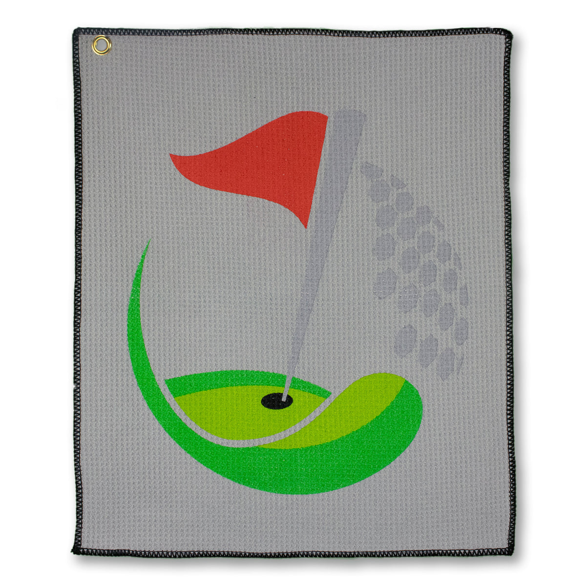 The Pro Towels Microfiber Waffle Small Golf Towel is gray with a golf hole graphic featuring green grass, a red flag, and a gray ball trail. It has black stitched edges, waffle weave texture, and a metal grommet in the top left corner.