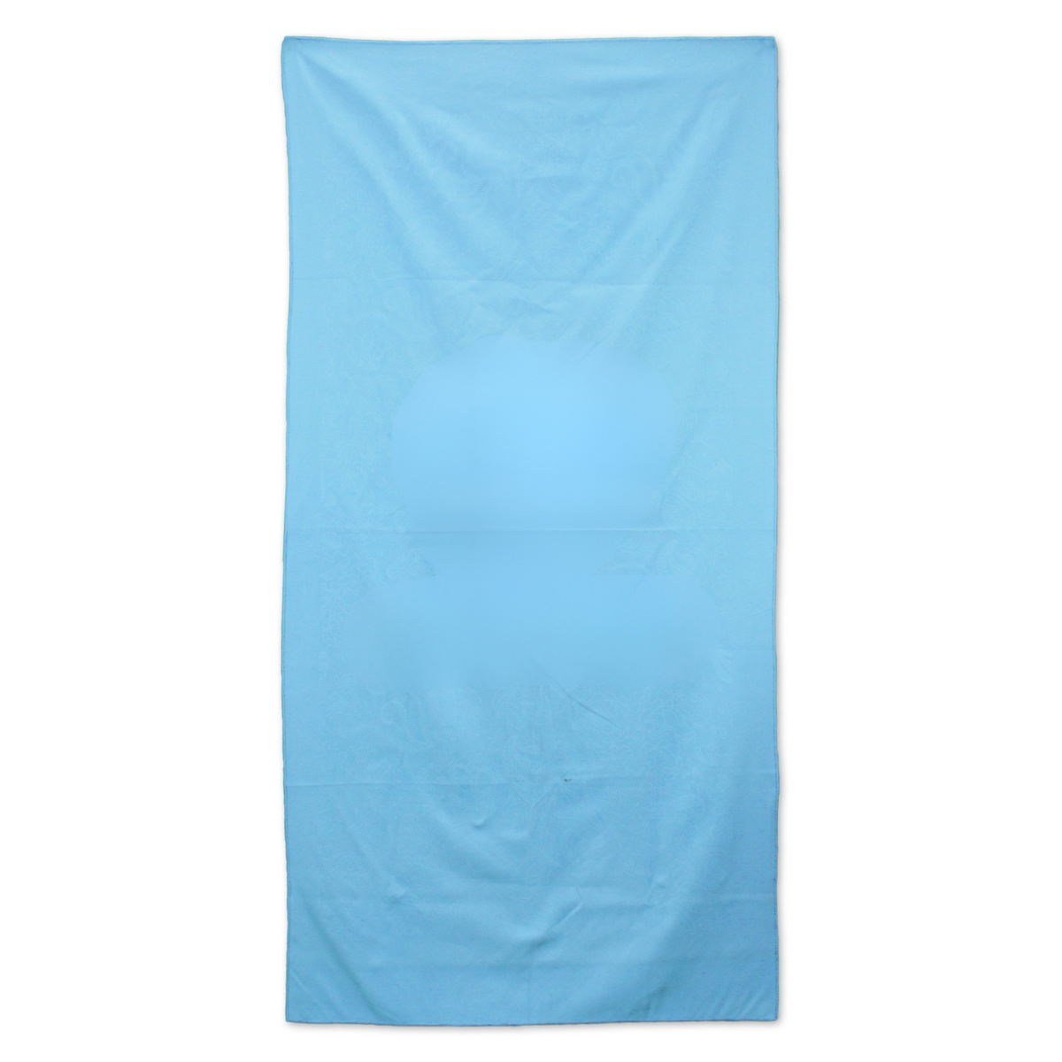 The Pro Towels Microsuede Beach Towel, large and rectangular in light blue, is laid flat on a white background. Subtle folds and a faint central pattern are visible on its soft surface.
