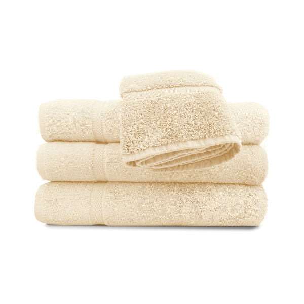 Four Ganesh Mills Hand Towel - Oxford Imperiale Color Towels are displayed: three folded and stacked, with a fourth draped over the top, all appearing soft and plush against a white background.