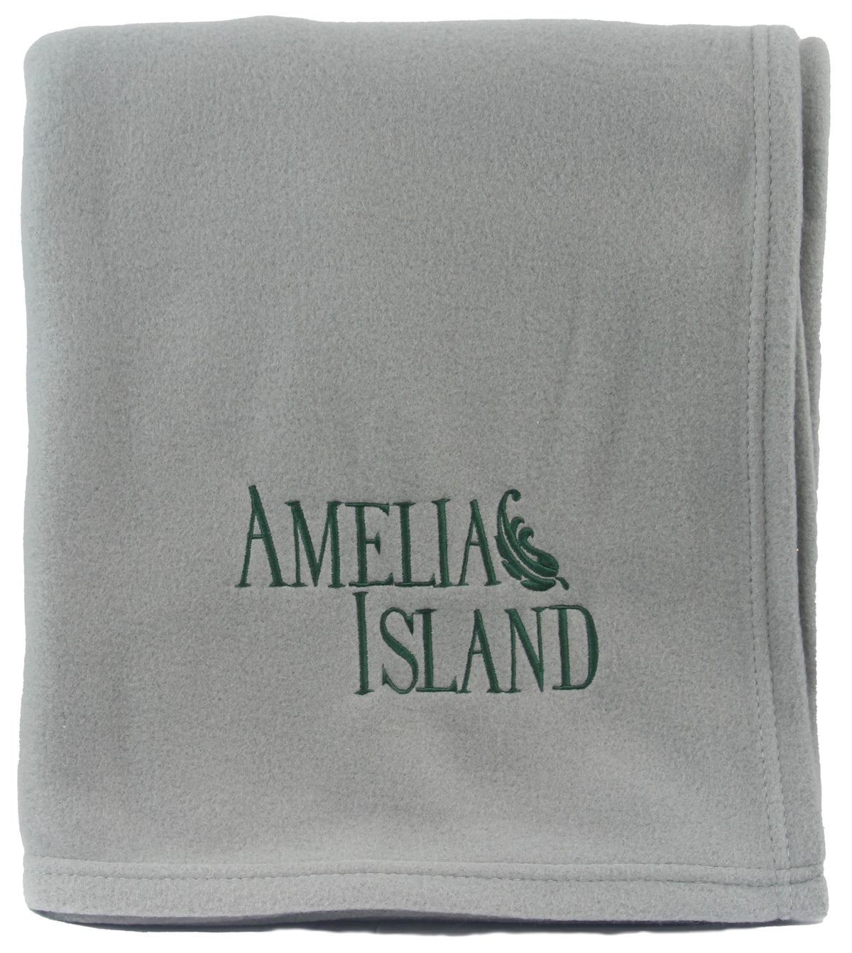 A neatly folded light gray Pro Towels Promo Fleece Blanket features Amelia Island custom embroidered in green on the front.
