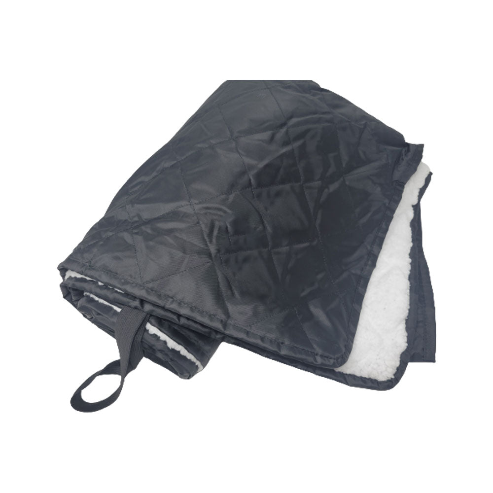 The Pro Towels Waterproof Sherpa Blanket features a folded, black quilted exterior, soft white sherpa lining, and a black strap. Perfect for picnics or camping. Shown on a white background. Custom embroidery available.