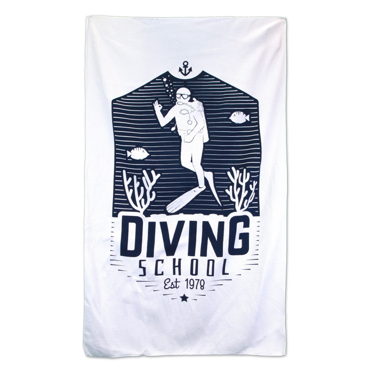 The Pro Towels Waffle Weave Beach Towel features a navy scuba diver, coral, and fish on a white background with “DIVING SCHOOL Est 1978” printed below.