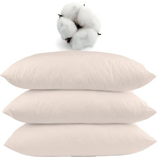 Three white pillows stacked with a cotton boll on top, highlighting their cotton fill and pairing perfectly with the Bargoose AllergyCare™ Allergen Barrier Organic Cotton Pillow Protector for added comfort.