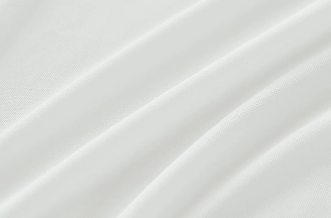 The Bargoose AllergyCare Cotton Zippered Mattress Encasement - 9 Deep features smooth white cotton with a clean, minimal look—perfect for bed bug protection.