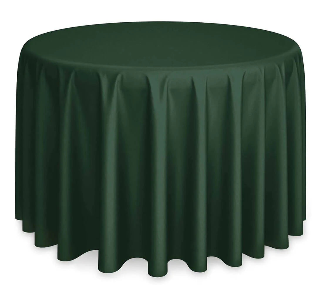 A round table is draped to the floor with Ganesh Mills’ Oxford Round Table Linen - Multicolor, featuring smooth, soft folds. Ideal for those seeking high-quality wholesale table linens. The background is plain white.