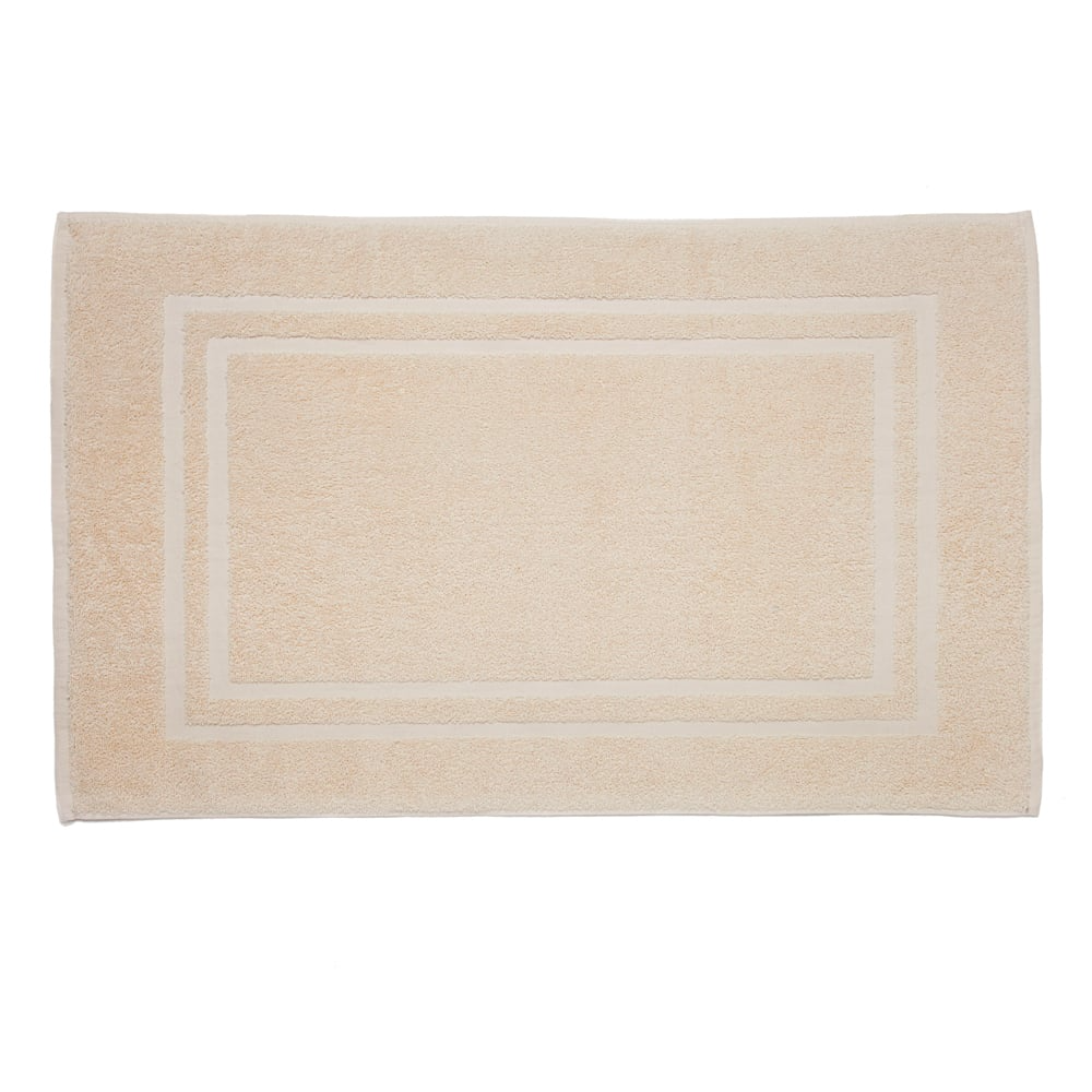 The Dobby Towel - Martex Sovereign by WestPoint Home features Intelliweave construction, a soft beige texture, and a subtle double border design. It is rectangular and shown from above against a white background.