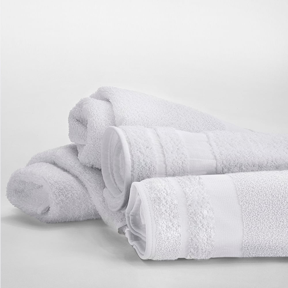 Three white Martex Cabana Collection Pool Towels by WestPoint Home, featuring a textured patterned border, are neatly rolled and stacked on a white surface. The towels appear soft and fluffy.