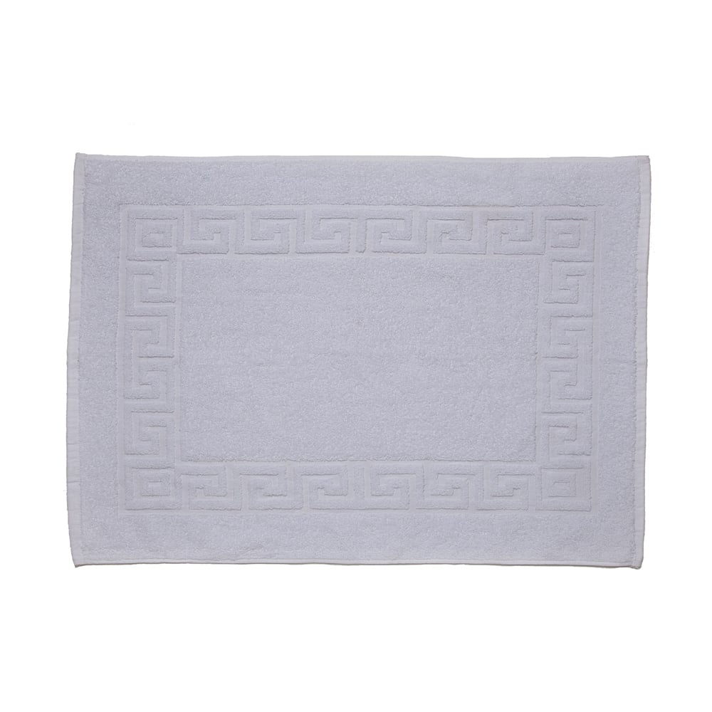 A light gray rectangular Martex Cam Towel bath mat by WestPoint Home, featuring a Greek key border and soft cotton texture, shown on a white background.