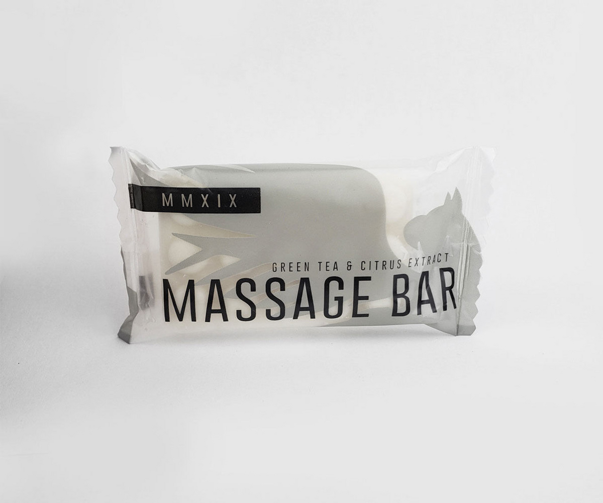 A rectangular soap bar called Soap (Rectangle Shape) - Candy Wrap Embossed by Ganesh Mills, with clear minimalist packaging, makes an ideal premium hotel amenity for upscale settings.