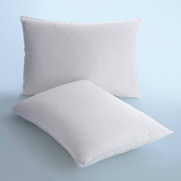 Two Martex Ultra Touch Pillows by WestPoint Home, filled with EcoPure fiberfill, are shown against a light blue background—one pillow stands upright while the other lies flat in front.