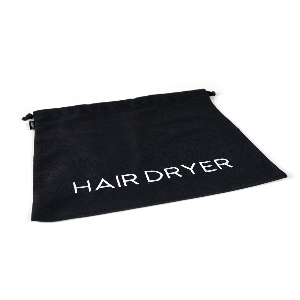 The Martex Basics Hair Dryer Bag by WestPoint Home is a black, machine-washable drawstring bag with “HAIR DRYER” in bold white letters—ideal for any hotel bathroom.