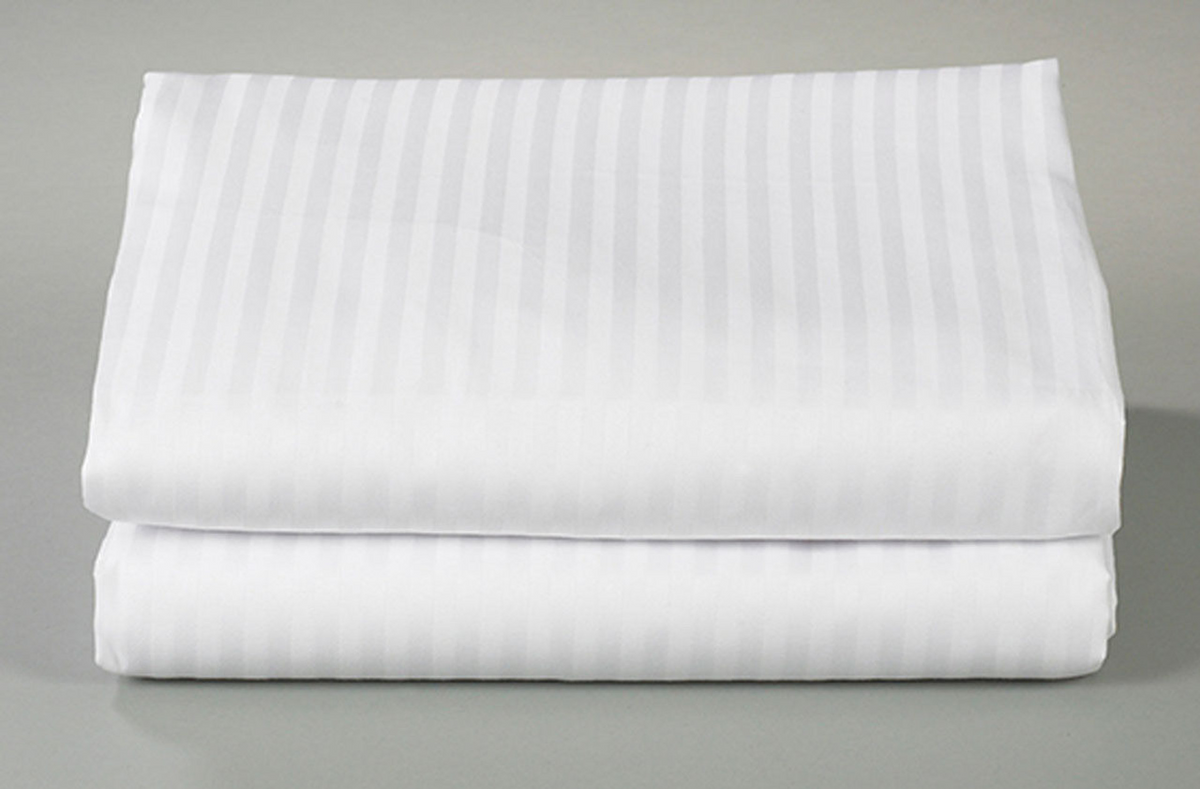 Thomaston Mills Pillowcases - 310 Thread Count Satin Stripe, in durable white with a subtle vertical stripe pattern, evoke luxury hotel linens and are neatly folded on a light gray surface.