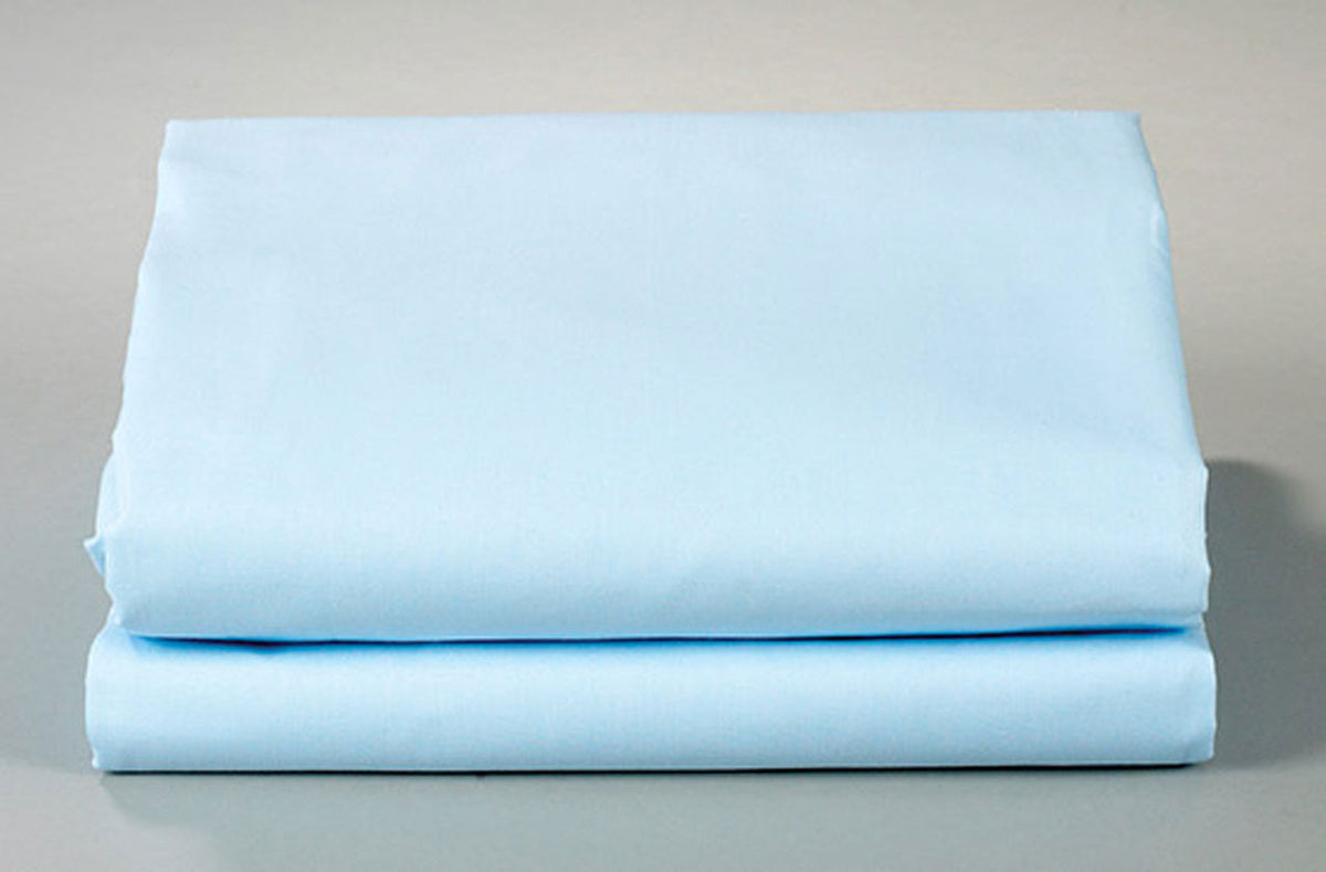 A neatly folded light blue Thomaston Mills Flat Sheet - Single Pick Percale is displayed on a flat surface against a plain, neutral background.