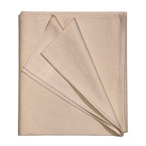 The KSE Sateen Draw Sheet / Lifters, made from unbleached cotton with visible seams and layered corners, is neatly folded and displayed on a white background.