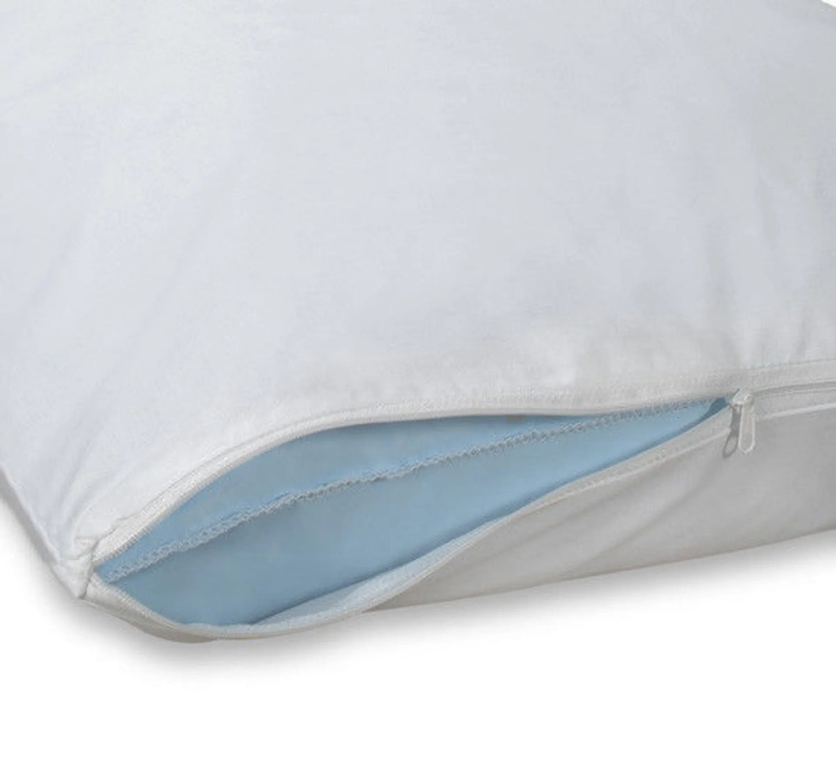 A close-up shows the Ganesh Mills Oxford Zipper Pillow Protector - Waterproof, featuring a white zippered case partially open to reveal a light blue inner lining. The smooth, clean fabric highlights its quality and protective design.