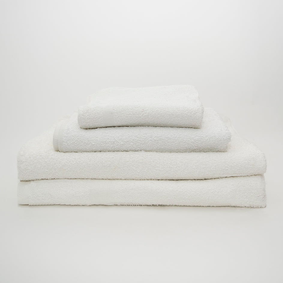 A stack of three Calderon Textiles Sweet 16 Hand Towels, neatly folded and displayed on a plain white surface with a white background.