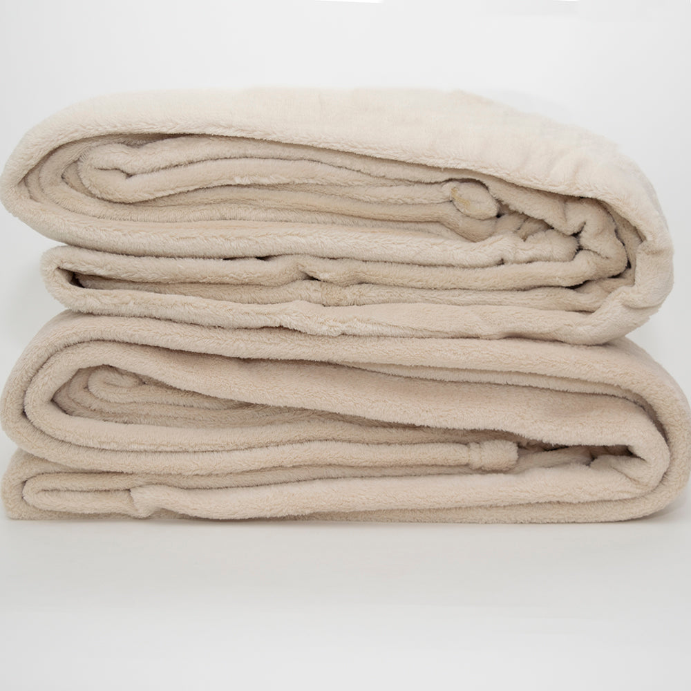 Two folded Calderon Textiles Plush Microfiber Twin blankets stacked on a plain white background, providing warmth and comfort.