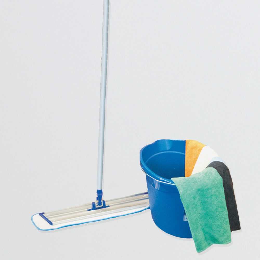 A Calderon Textiles Mop Frame Aluminum with a white pad stands by a blue bucket holding four microfiber bar towels—orange, white, green, and black—ideal for reducing laundering costs against a light background.