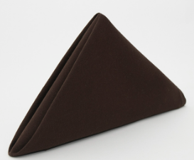 The Calderon Textiles Prisma Napkin, in dark brown with exceptional stain resistance, is neatly folded into a standing triangular shape against a plain white background.