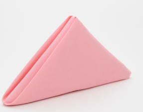 The Prisma Napkin by Calderon Textiles, featuring Color Lock dyeing technology in pink, is neatly folded into a triangle and displayed against a plain white background.