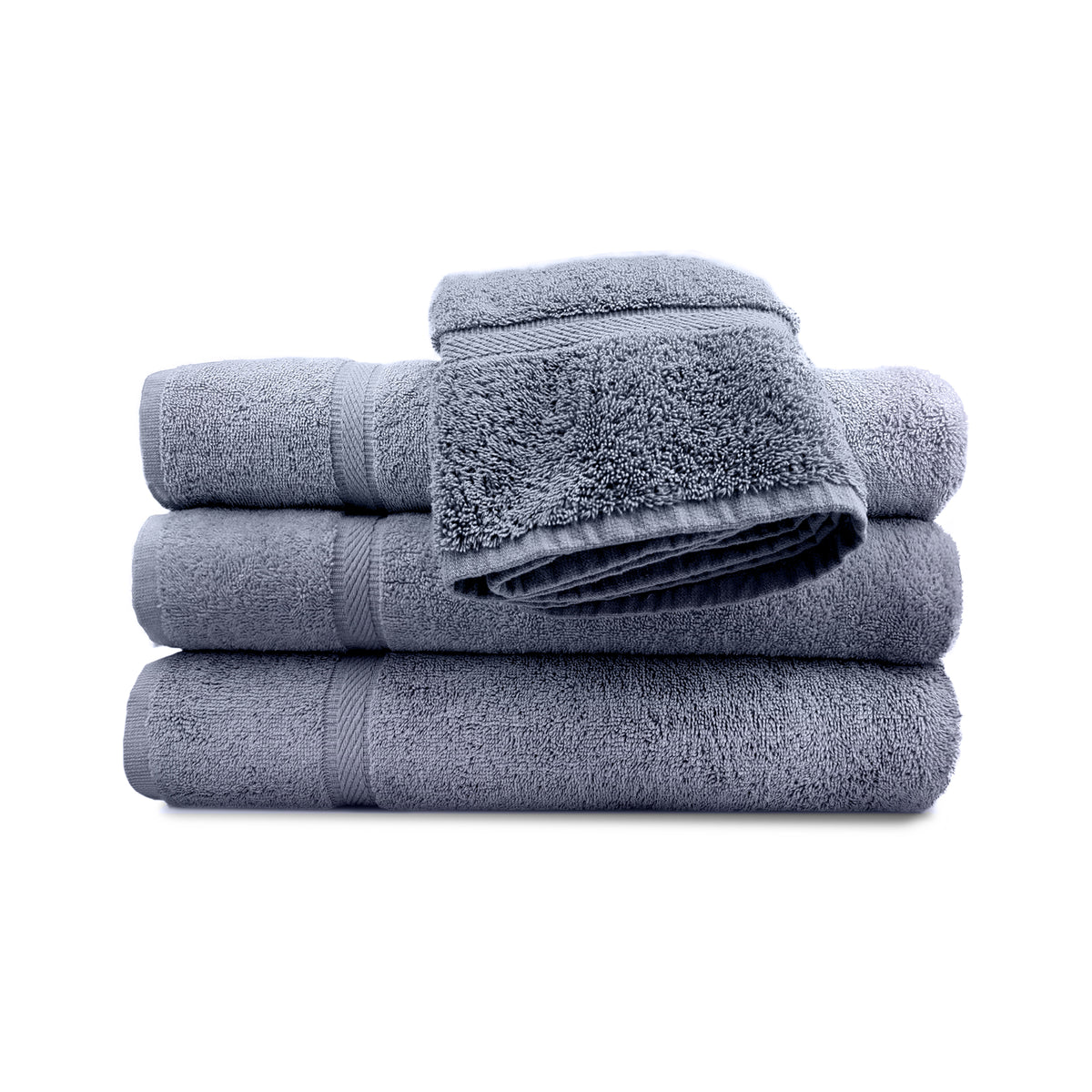 A stack of Ganesh Mills Oxford Imperiale Color Towels, including three gray luxury hotel bath sheets and a matching washcloth, are neatly folded against a white background.