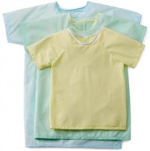 Three KSE Knitted Pediatric IV Gowns - Everlast in pastel colors, featuring a yellow flame retardant gown over two light blue gowns, all laid flat and slightly overlapping.