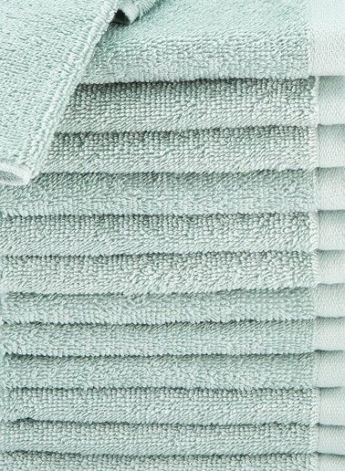 A close-up of KSE Wash Cloths - 10 Single Color Towels shows their soft texture and neat stacking, ideal for anyone needing quality bulk towels.