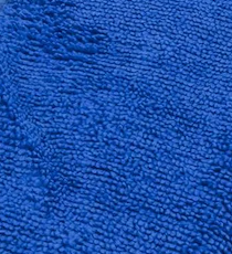 Close-up of KSE Microfiber Cleaning Cloth, showcasing its textured blue surface with soft, looped fibers—perfect for bulk purchases and wholesale cleaning needs.