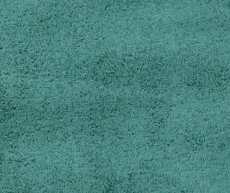A close-up of teal textured fabric from KSE Microfiber String Dust Mop Pads - Velcro Style, highlighting its soft, slightly uneven surface designed for excellent dust-trapping performance.