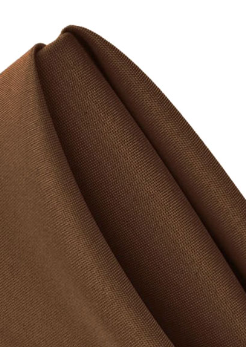 Close-up of a neatly folded brown Ganesh Mills Oxford Spun Poly Satin Band Napkin, highlighting its smooth texture and premium quality.