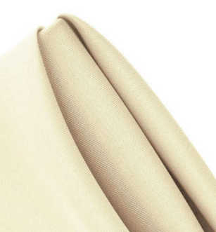 Ganesh Mills MagicSpun napkins feature beige fabric, neatly folded to reveal a smooth, slightly textured surface with soft lines—ideal for bulk buyers or those seeking quality wholesale napkins.