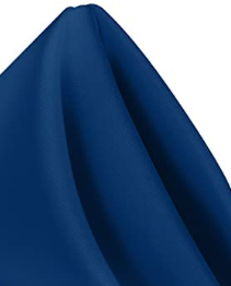 A close-up of a neatly folded Ganesh Mills MagicSpun napkin in dark blue polyester, standing upright with smooth, sharp creases—ideal for anyone seeking quality wholesale napkins.