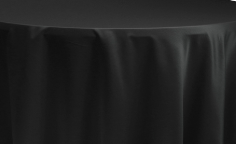 The Oxford Round Table Linen by Ganesh Mills features a multicolor design that drapes smoothly over round tables, creating soft folds and elegant shadows.