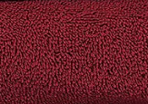 Close-up of Intralin Spa Hand Towel - Spectrum Towels, highlighting its textured dark red fabric with looped fibers and a soft, premium surface.