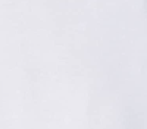 A close-up of a softly lit, textured white surface evokes the gentle fabric of KSE Slip-Over Baby Shirts - Short Sleeve, made for 3-month-olds. No distinct patterns or objects are visible.