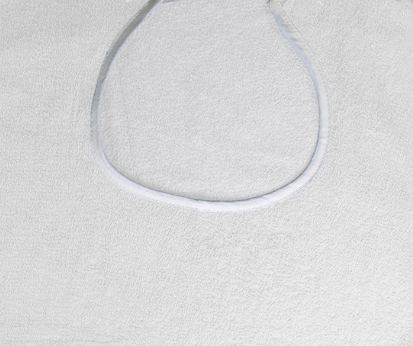 A close-up of the KSE Premium Adult Terry Bib / Clothing Protector with metal snap closure, featuring a rounded neckline and simple border—perfect for comfort and available in bulk wholesale.