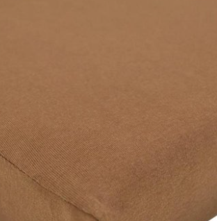 A close-up of the KSE Knitted Bassinet and Crib Sheets shows their soft texture and snug fit on a mattress corner—ideal for those seeking comfortable, well-fitted crib sheets.