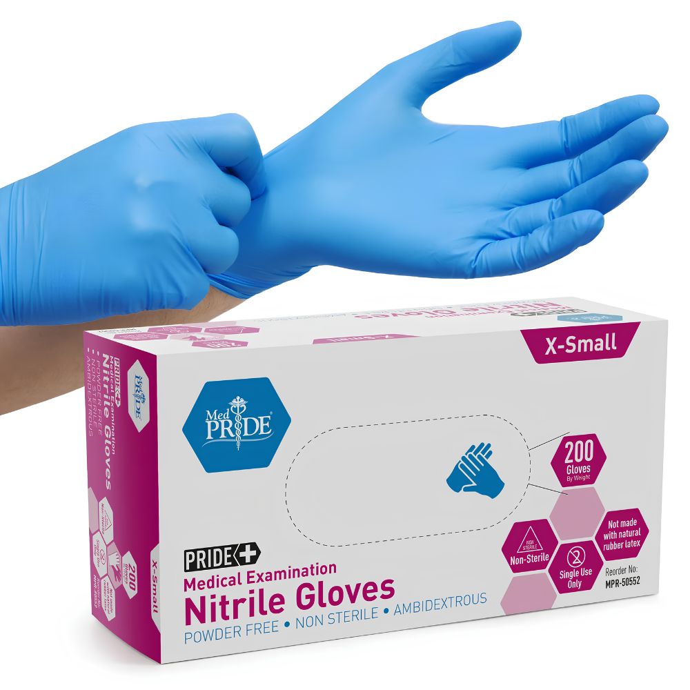 A person puts on a blue nitrile exam glove. In the foreground is a Shield Line box labeled MedPride Nitrile Exam Gloves, 4.3 Mil Thick, Non-Sterile, Powder Free—X-Small, 200 disposable latex-free gloves with purple and blue accents.