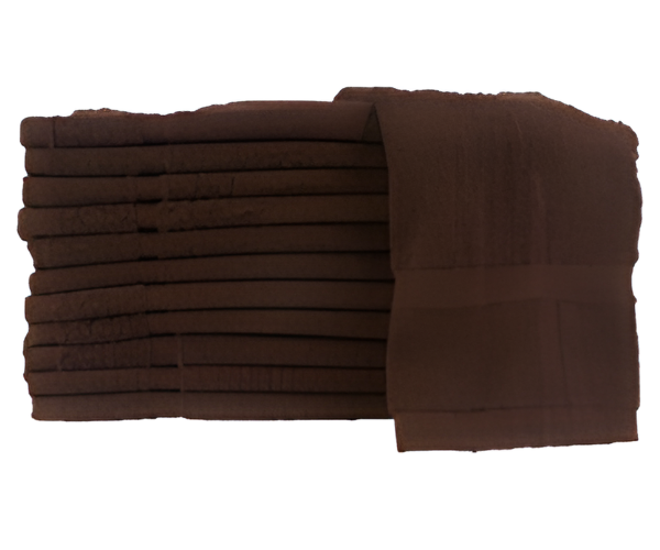 A stack of Manhattan Hosiery Co. 10S Cotton Towels in various sizes and weights, neatly folded with one partially unfolded on top, displayed against a white background.